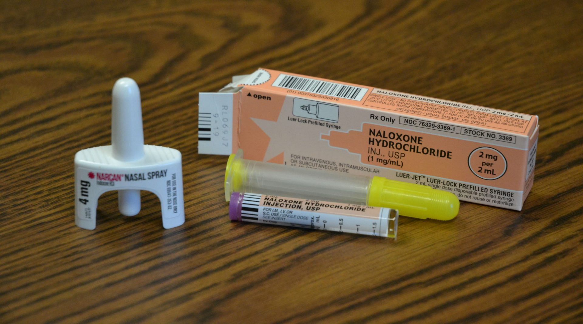 At left, 4mg Narcan nasal spray, which the state has distributed to first responders. At right, intravenous naloxone used by paramedics. 