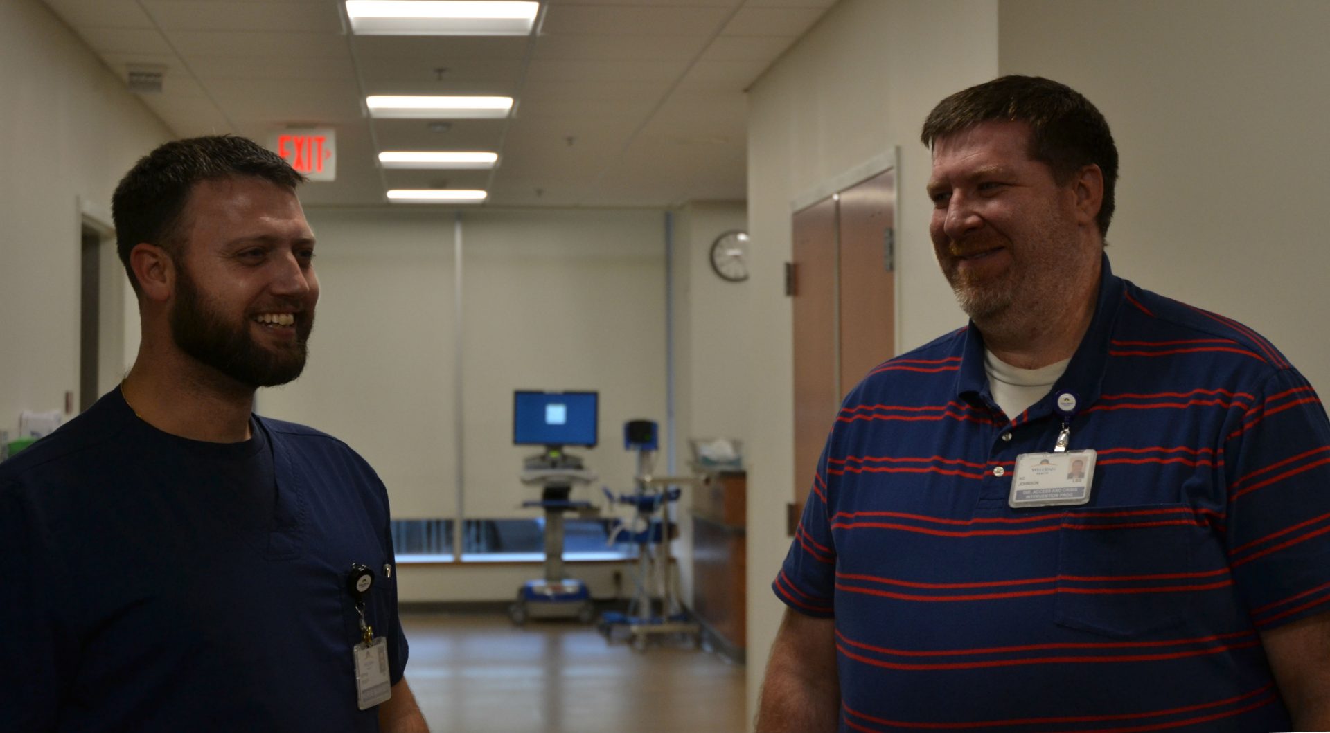 WellSpan Good Samaritan nurse manager Patrick Yeagley, at left, talks with WellSpan Philhaven director of access and crisis intervention KC Johnson, at right.  