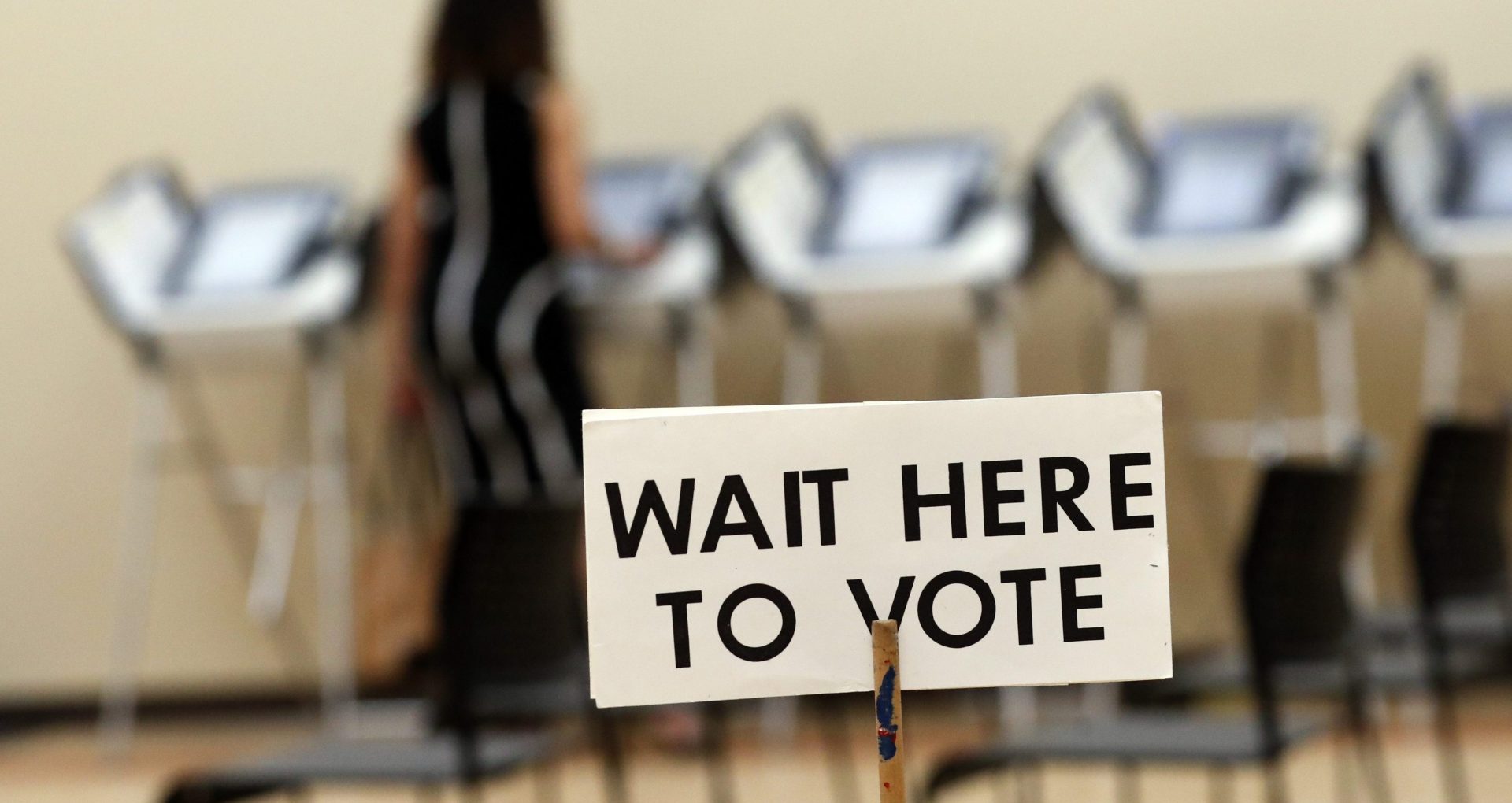 FILE PHOTO: In this Wednesday, May 9, 2018, photo, Pamela Hampton votes in Sandy Springs, Ga. 