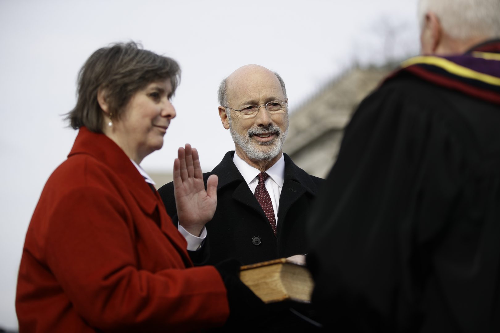 Pennsylvania Gov. Tom Wolf, accompanied by his wife Frances, takes the Oath of Office as he is sworn in for his second term, Tuesday, Jan. 15, 2019, at the state Capitol in Harrisburg, Pa. 