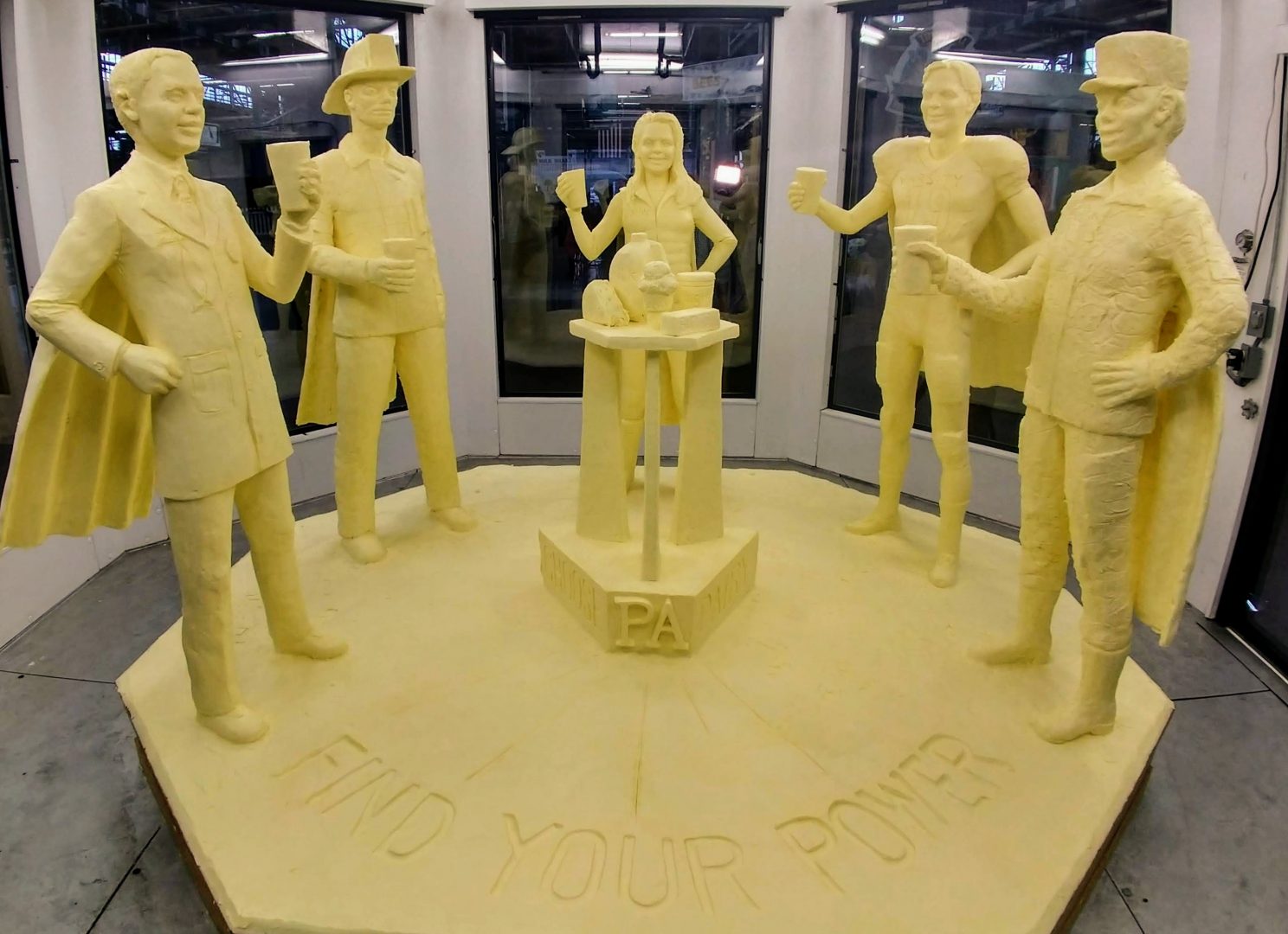 As dairy industry struggles, a halfton butter sculpture embraces the