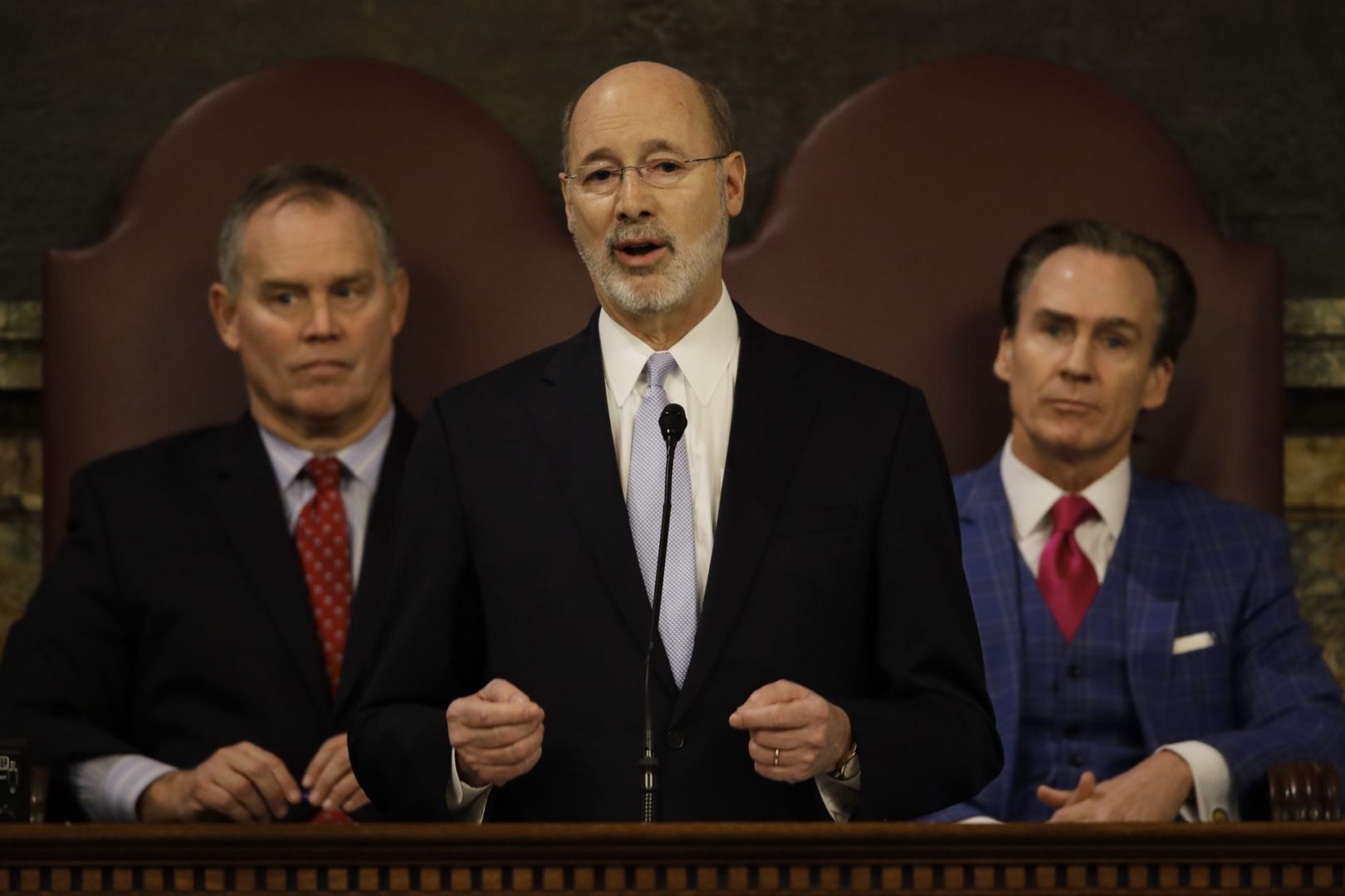 Gov. Tom Wolf delivers a previous budget address to a joint session of the Pennsylvania House and Senate. Former Speaker of the House of Representatives, Rep. Mike Turzai, R-Allegheny, is at left, and former Lt. Gov. Michael Stack is at right.