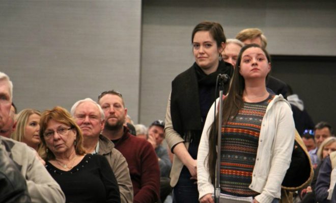Amanda Vendetti of Tullytown and other Lower Bucks County residents line up to ask questions of DEP officials about a toxic waste recycling and storage facility proposed for Falls Township, Pa. 