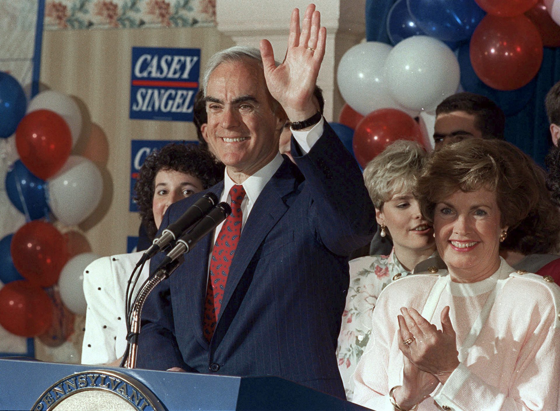 In this May 15, 1990, file photo, Pennsylvania Gov. Robert P. Casey waves as he celebrates winning the Democratic nomination for governor again during a primary night party in Scranton, Pa.