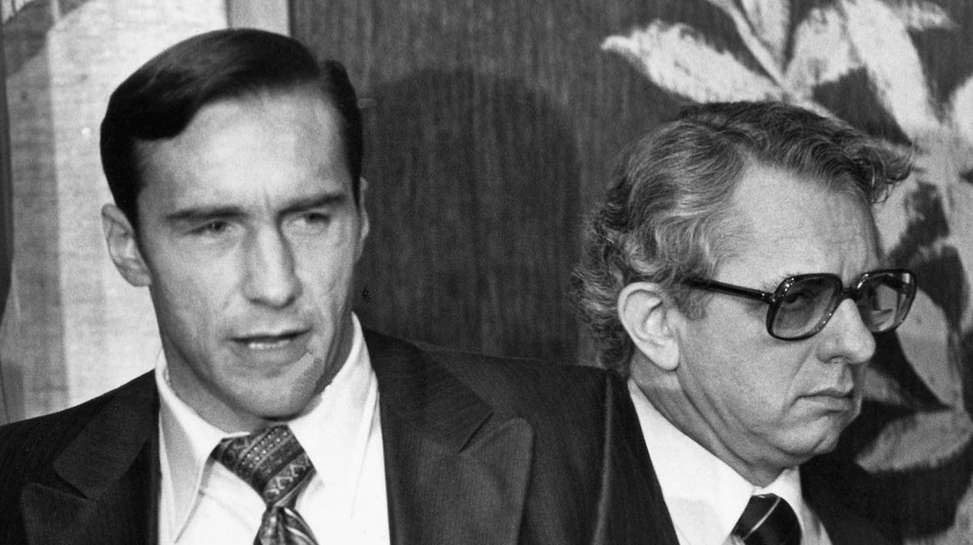 Walter Creitz, right, president of Metropolitan Edison Company, turns away as company Vice President John Herbein answers questions at a news conference in Hershey, Pa., on March 29, 1979. The conference was held because of an accident that occured at the company's Three Mile Island nuclear power plant near Harrisburg, Pa., that caused radiation leakage into the atmosphere.