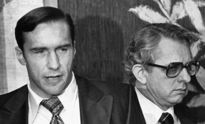 Walter Creitz, right, president of Metropolitan Edison Company, turns away as company Vice President John Herbein answers questions at a news conference in Hershey, Pa., on March 29, 1979. The conference was held because of an accident that occured at the company's Three Mile Island nuclear power plant near Harrisburg, Pa., that caused radiation leakage into the atmosphere.