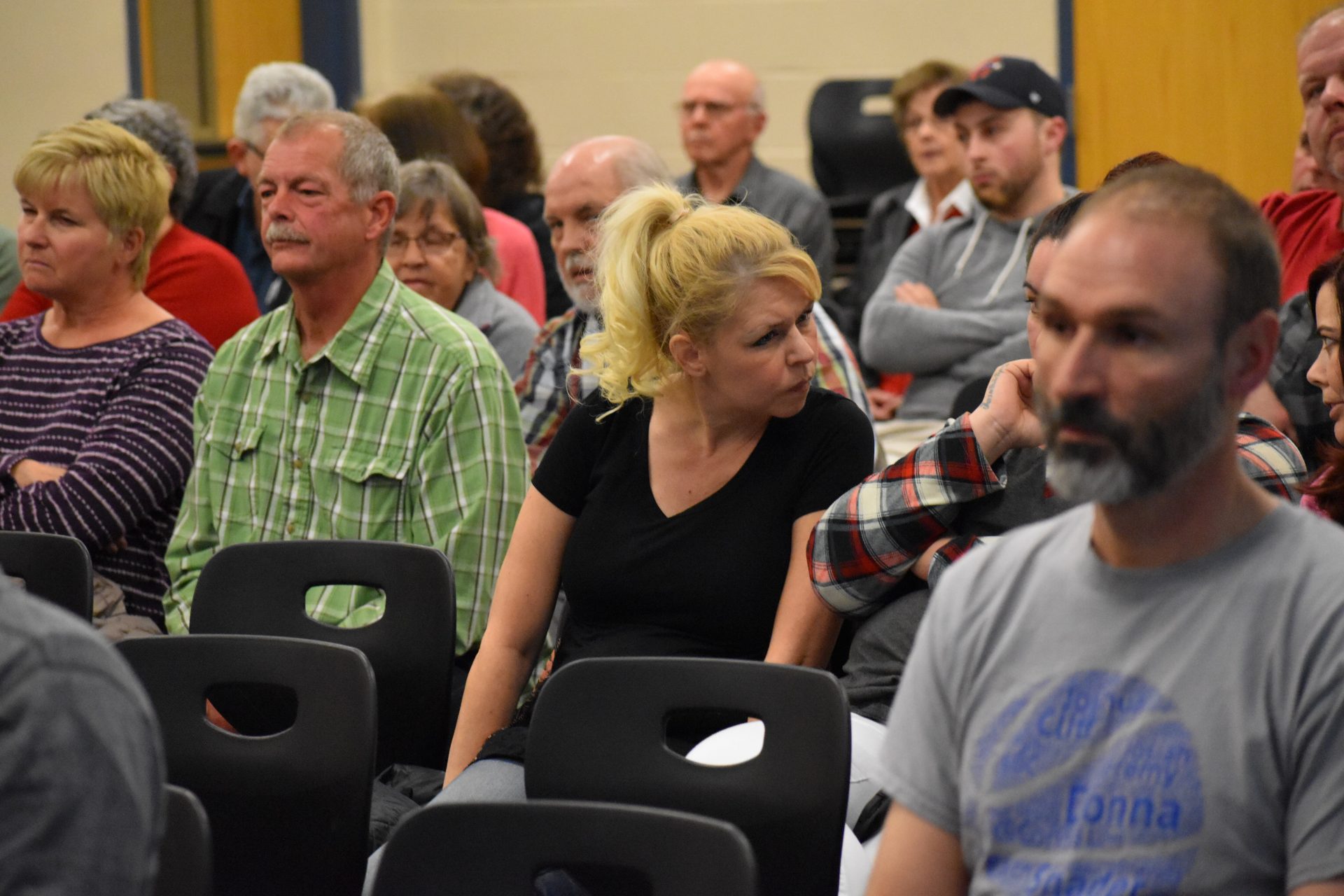 Hope Adkins-Durante, in the black shirt, listens to another community member during a meeting on March 14, 2019, in the Eastern Lancaster County School District.