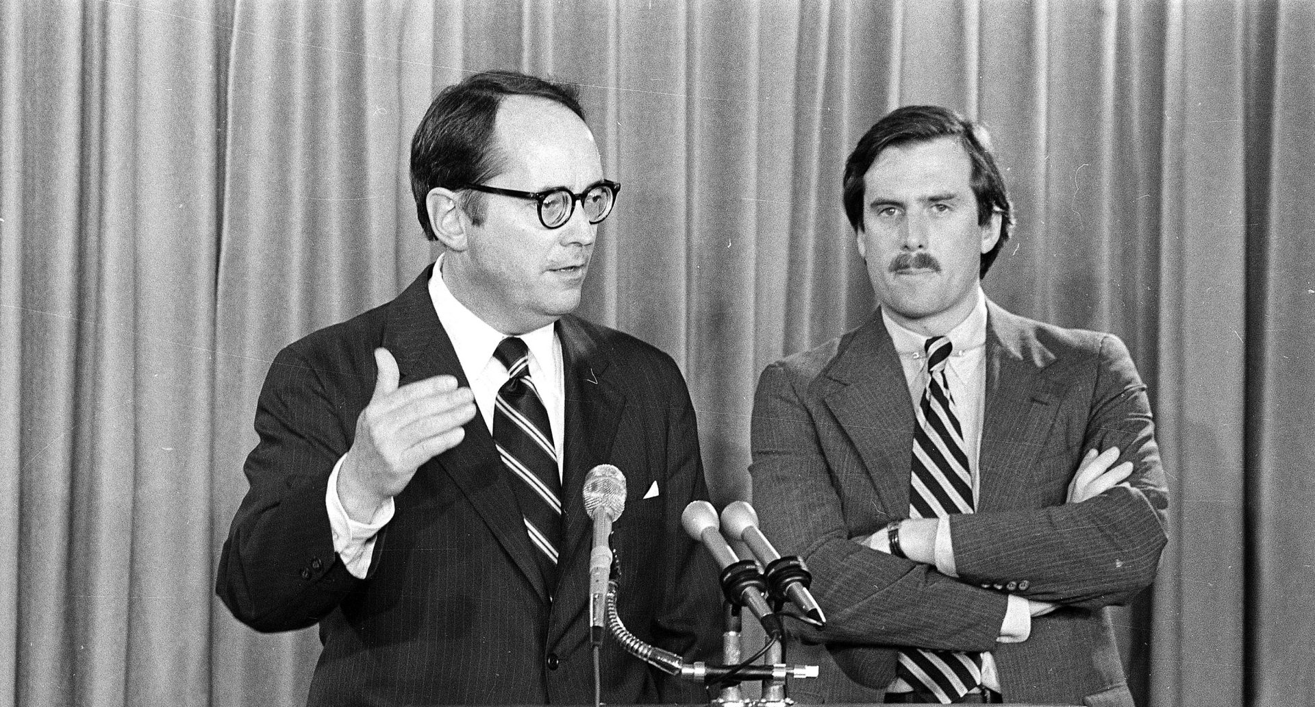 FILE PHOTO: Pennsylvania Governor Dick Thornburgh, left, announces the closing of schools in the area around the Three Mile Island PWR, on March 30, 1979, in Harrisburg, Pa., after an accident at the nuclear power plant led to the release of radioactive gas from the reactor into the atmosphere. The governor advised the evacuation of small children and pregnant women. Standing at right is Lt. Gov. William Scranton.