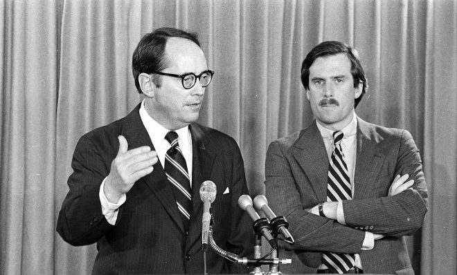 FILE PHOTO: Pennsylvania Governor Dick Thornburgh, left, announces the closing of schools in the area around the Three Mile Island PWR, on March 30, 1979, in Harrisburg, Pa., after an accident at the nuclear power plant led to the release of radioactive gas from the reactor into the atmosphere. The governor advised the evacuation of small children and pregnant women. Standing at right is Lt. Gov. William Scranton.
