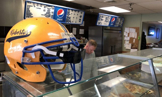 David Kitner works inside his pizza shop in Middletown on Friday, March 1, 2019.
