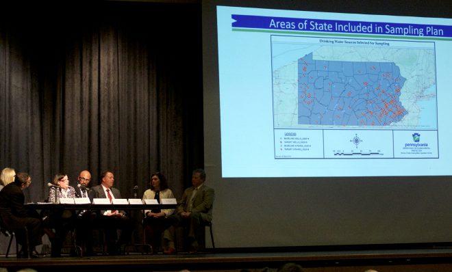 In this file photo, people at a community meeting in Abington, Pa. on April 15, 2019 got an update of where the state will test drinking water for levels of the toxic family of chemicals known as PFAS.  
