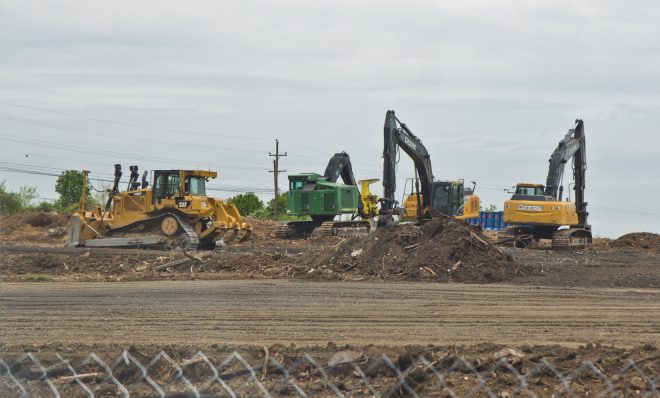 Crews work at the site of a sinkhole along the Mariner East pipeline route near the Pennsylvania State Police barracks on Route 1 in Delaware County on Thursday, April 25, 2019. Pipeline builder Sunoco said no pipelines were exposed and that the sinkhole was contained.