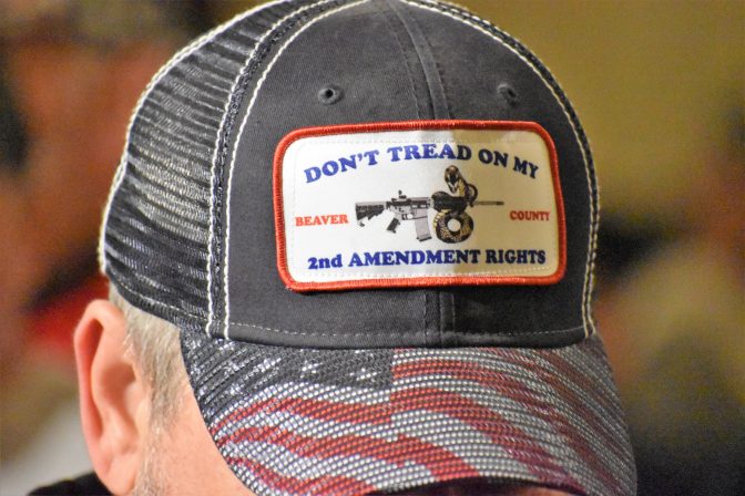 A man wears a "Don't Tread on My 2nd Amendment Rights" hat in the state Capitol during a rally on May 6, 2019.