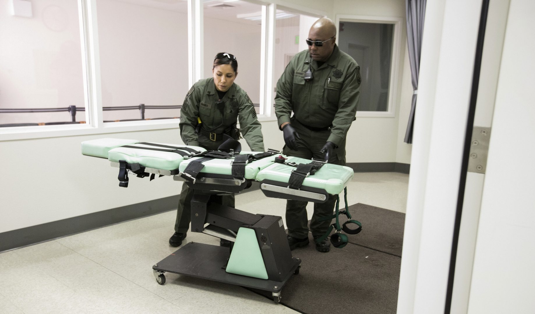 FILE PHOTO: In this photo provided by the California Department of Corrections and Rehabilitation a gurney is removed from the death penalty chamber at San Quentin State Prison, Wednesday, March 13, 2019, in San Quentin, Calif. 