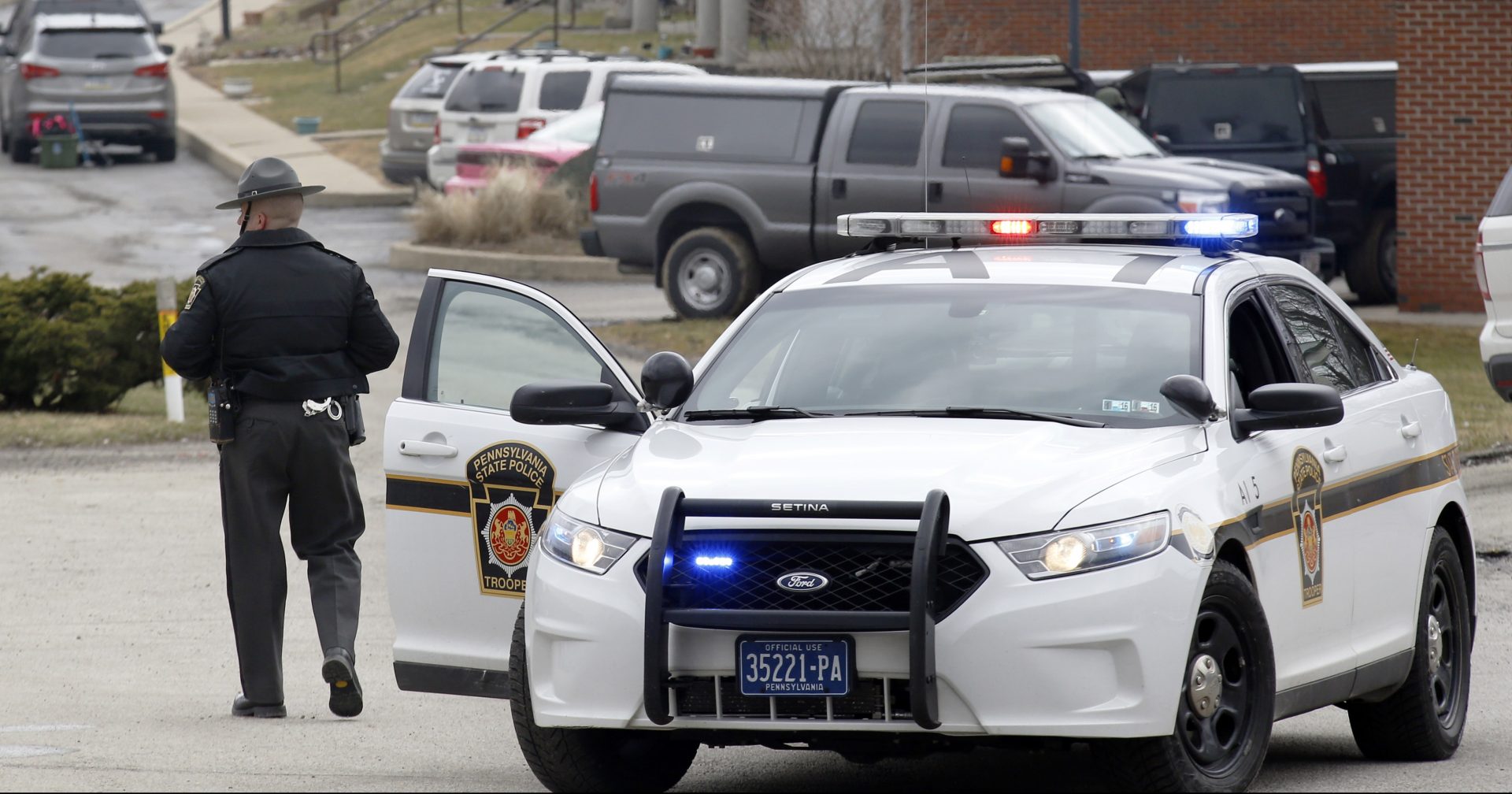 In this March 27, 2015 file photo, Pennsylvania State Police block the road to an apartment complex in Hempfield, Pa.