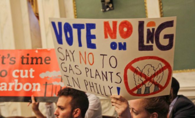 Opposition to the proposed liquefied natural gas plant in Philadelphia protest in city council chambers Thursday. 