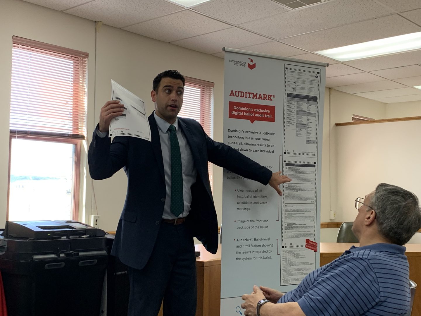 John Hastings, regional sales manager with Dominion Voting Systems, explains how the company's auditing system works to officials in Columbia County June 26, 2019. (Emily Previti, PA Post)