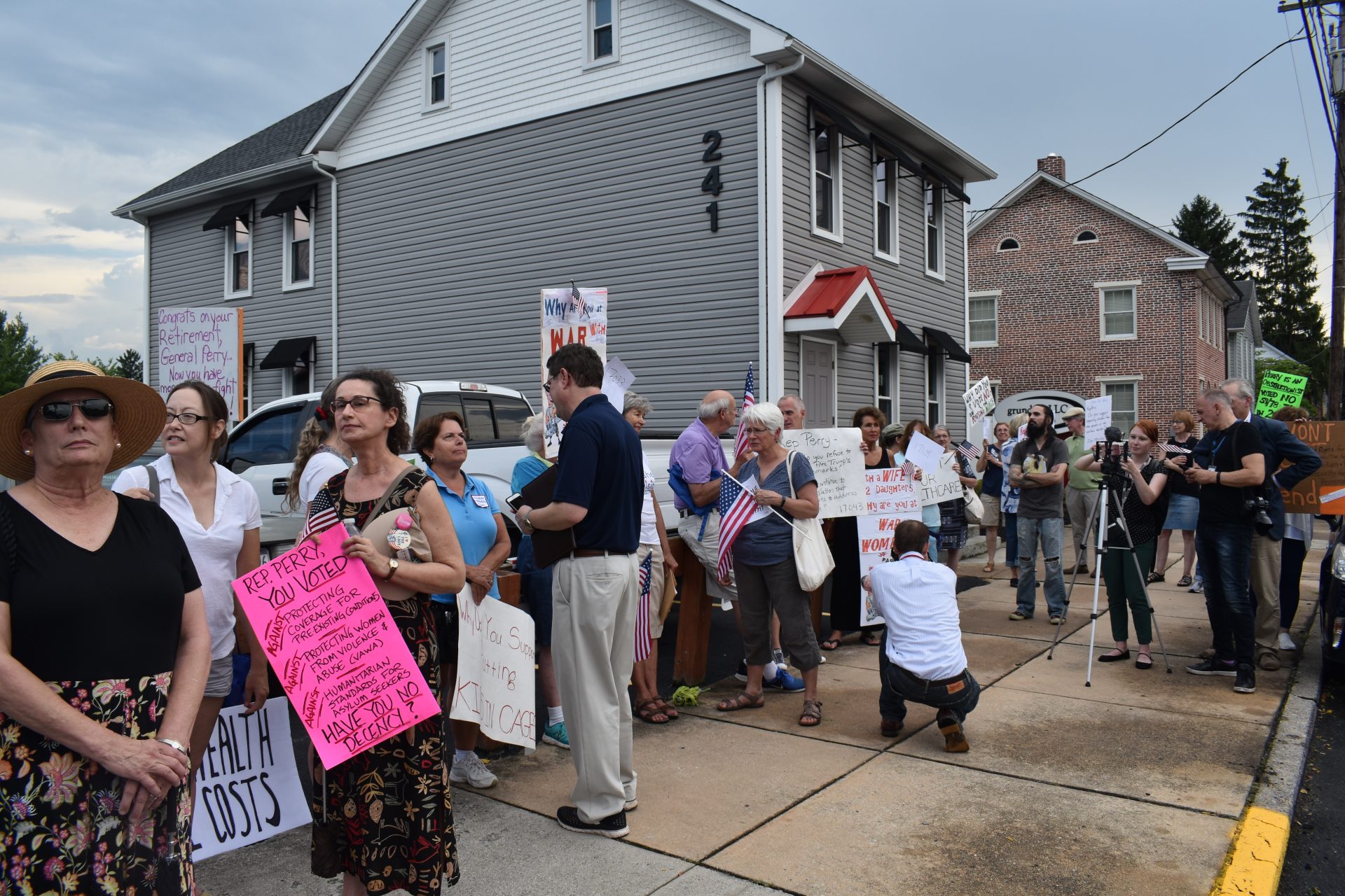 Protesters gathered outside the Hummelstown Fire Department on July 30, 2019, ahead of a town hall hosted by Republican Congressman Scott Perry of Pennsylvania.