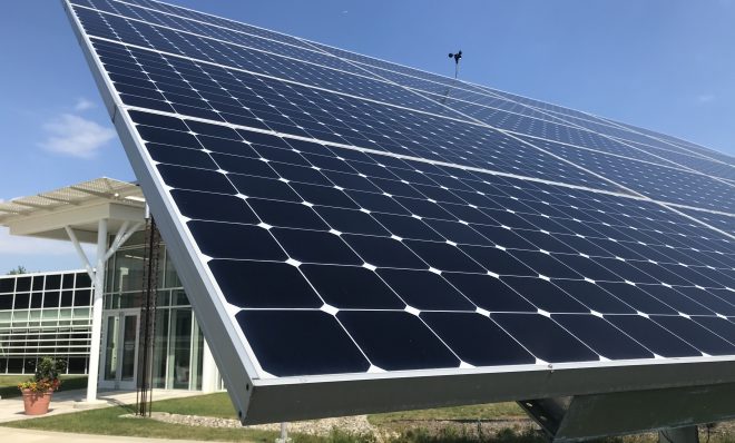 A ground-mounted solar panel at Millersville University tracks the sun's path across the sky.