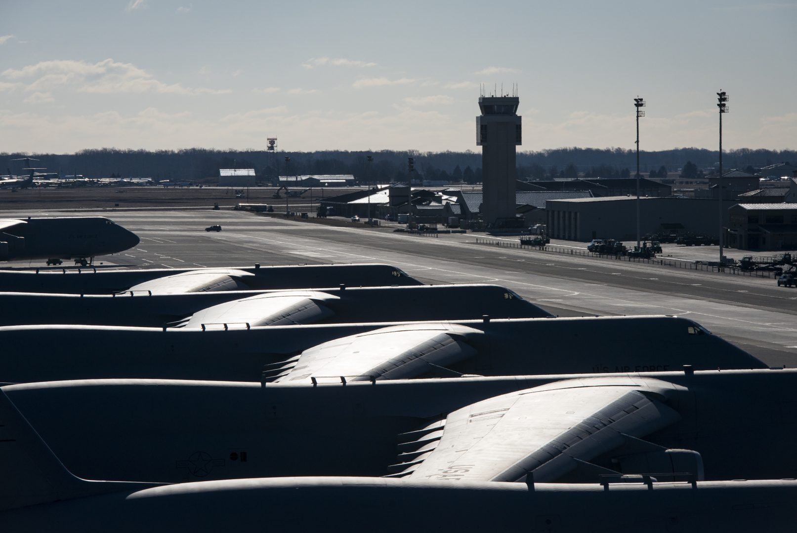 Several C-5 Galaxies sit on the flightline during the morning sunrise at Dover Air Force Base, Delaware, home to the 436th Airlift Wing. Photo used under creative commons license (https://bit.ly/1jNlqZo).