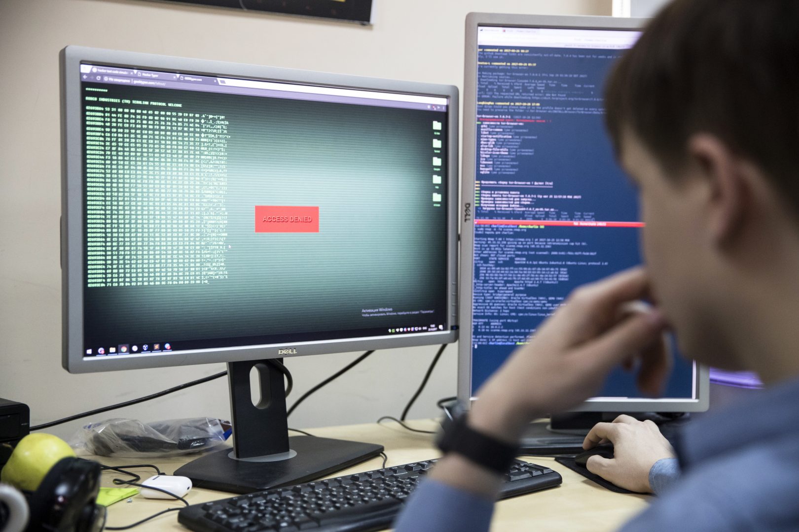 An employee of Global Cyber Security Company Group-IB develops a computer code in an office in Moscow, Russia, Wednesday, Oct. 25, 2017.