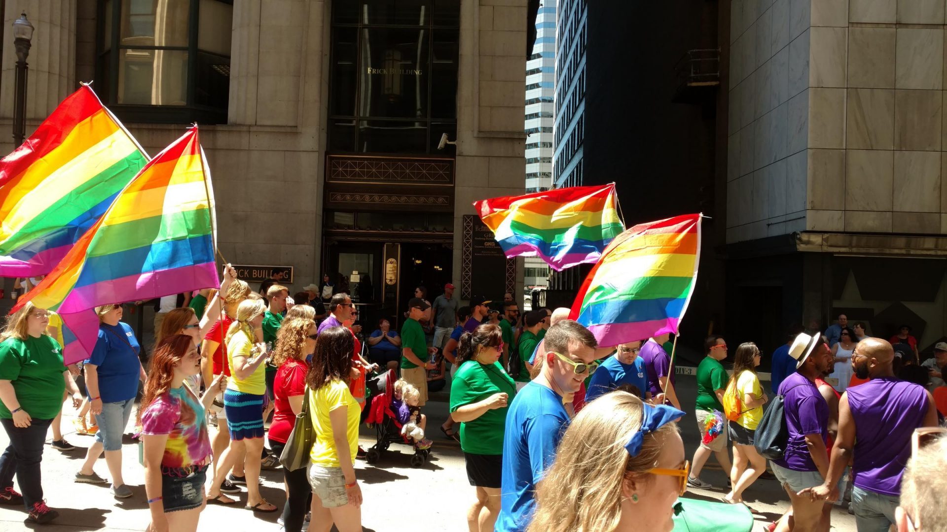Participants in Pittsburgh Pride walk through downtown in June 2016.