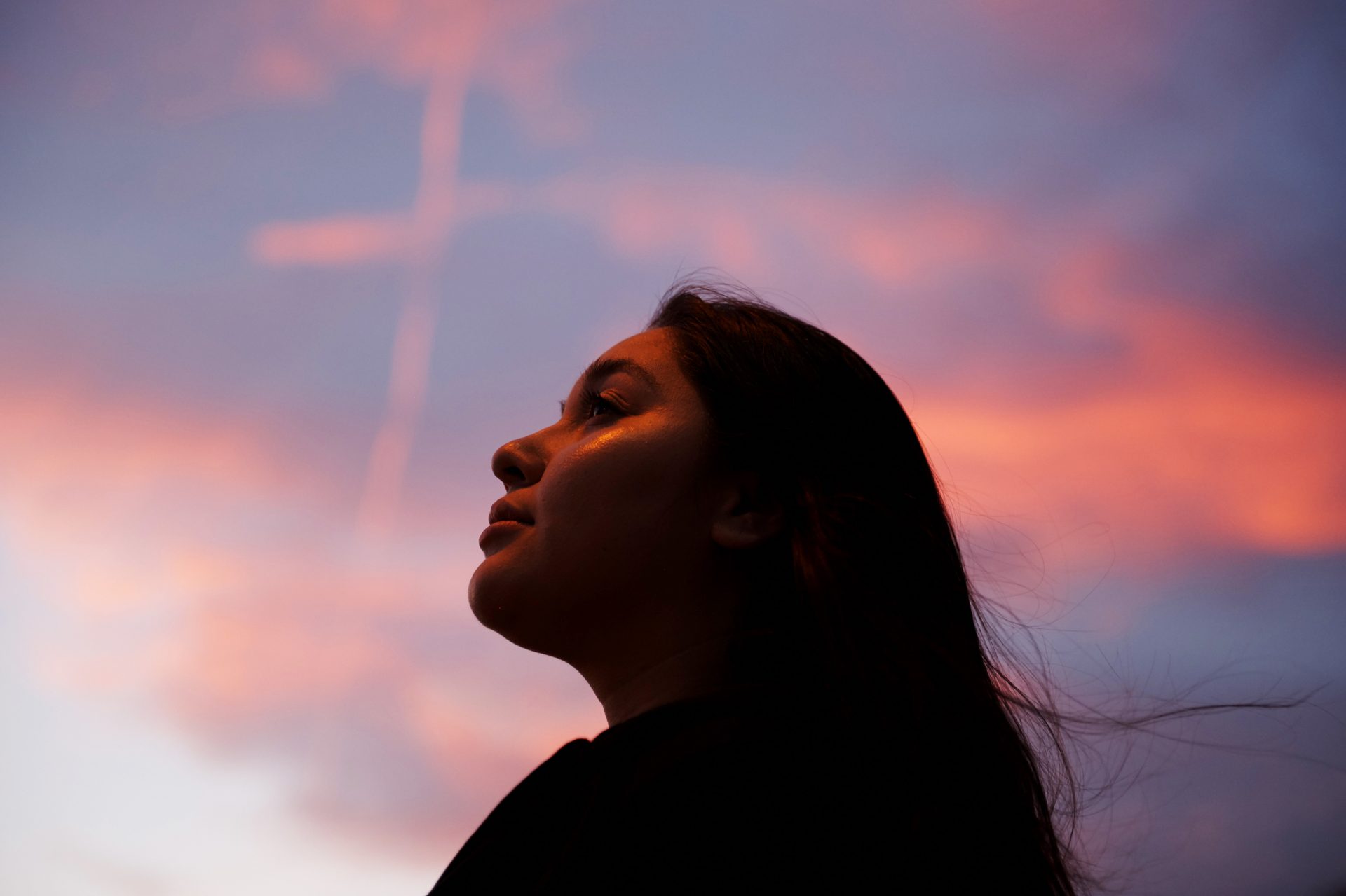 Survivor Susanan Anely stands on the sidewalk bordering the Healing Garden in Las Vegas. Since Route 91, she has moved back to Las Vegas, started a new job, gotten promoted, started school and fallen back in love with photography.