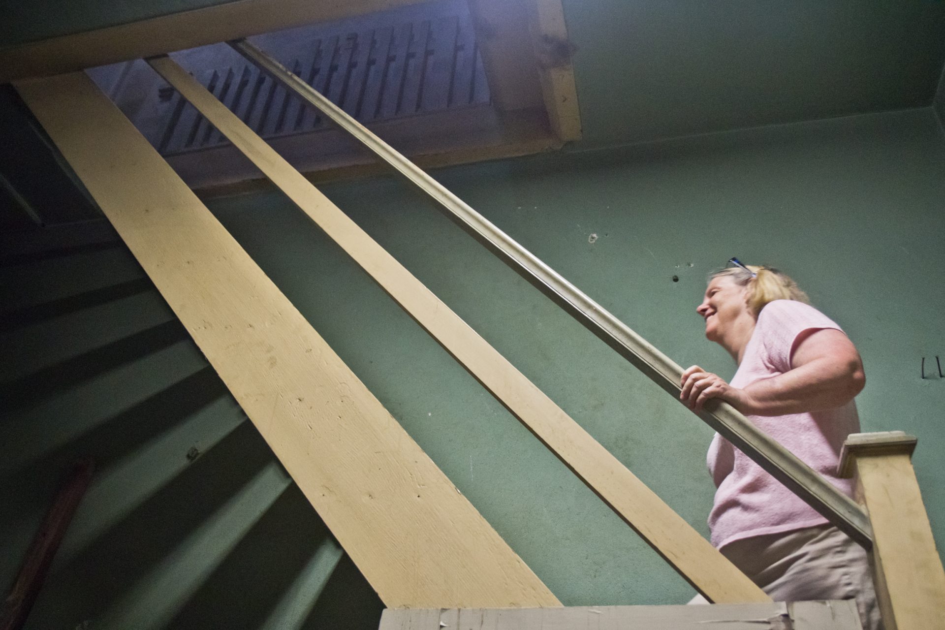 Carillon player Janet Tebbel climbs the steps to the bell tower at the Miraculous Medal Shrine.