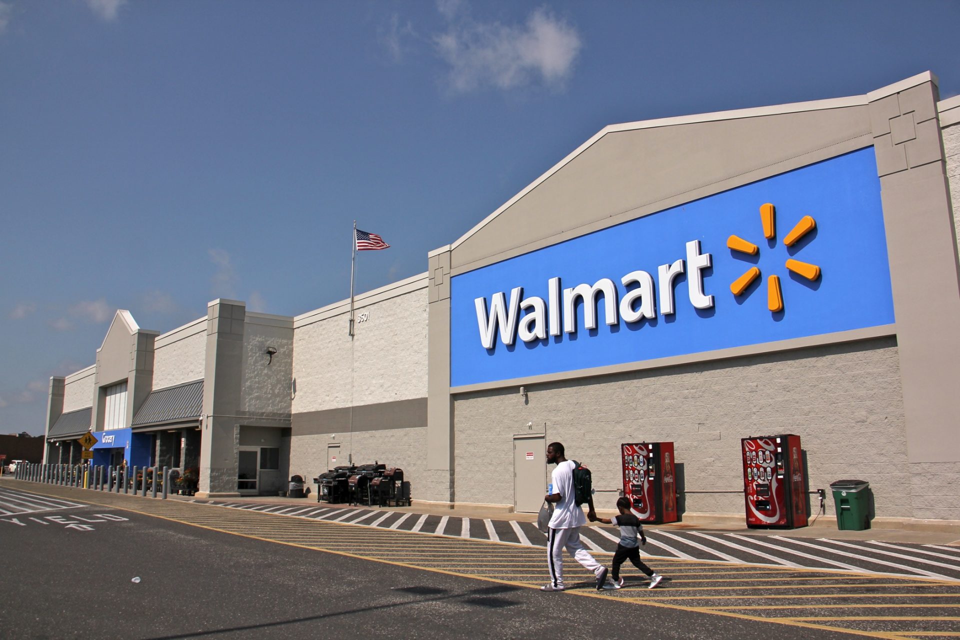 Customers leave a Walmart in Blackwood, N.J. Walmarts nationwide will no longer sell 223 ammunition, used in AR 15 rifles.