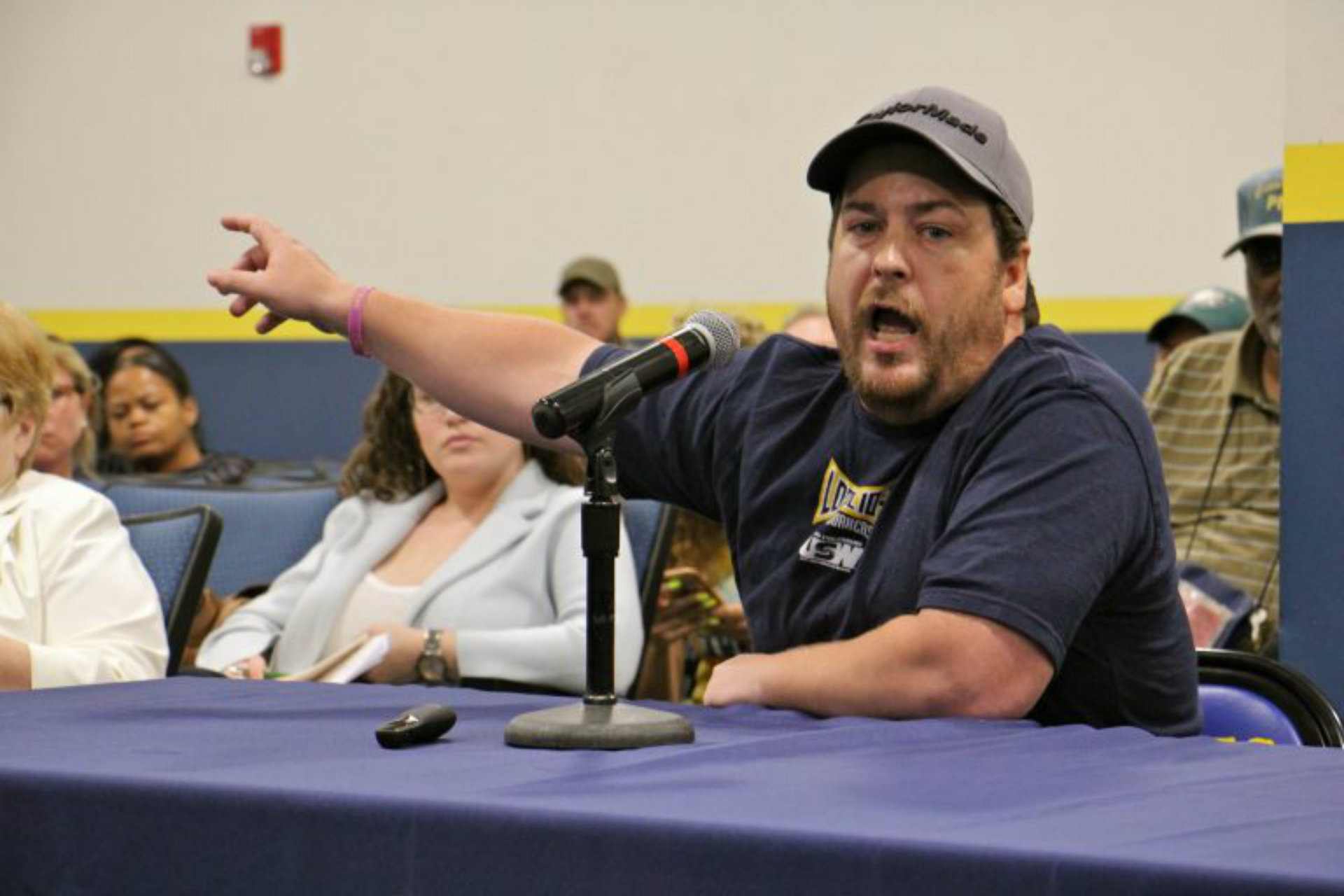 Refinery employee Shawn Tolomeo argues that the Philadelphia Energy Solutions property in South Philadelphia should remain a refinery. (Emma Lee/WHYY)