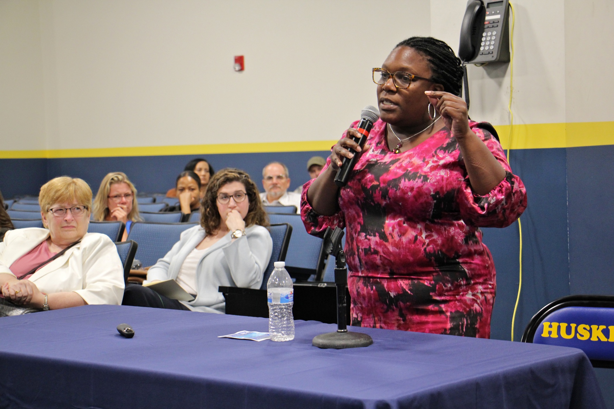 Kendra Brooks urges Refinery Advisory Committee members to consider their grandchildren’s children when deciding what should become of the PES refinery complex. (Emma Lee/WHYY)