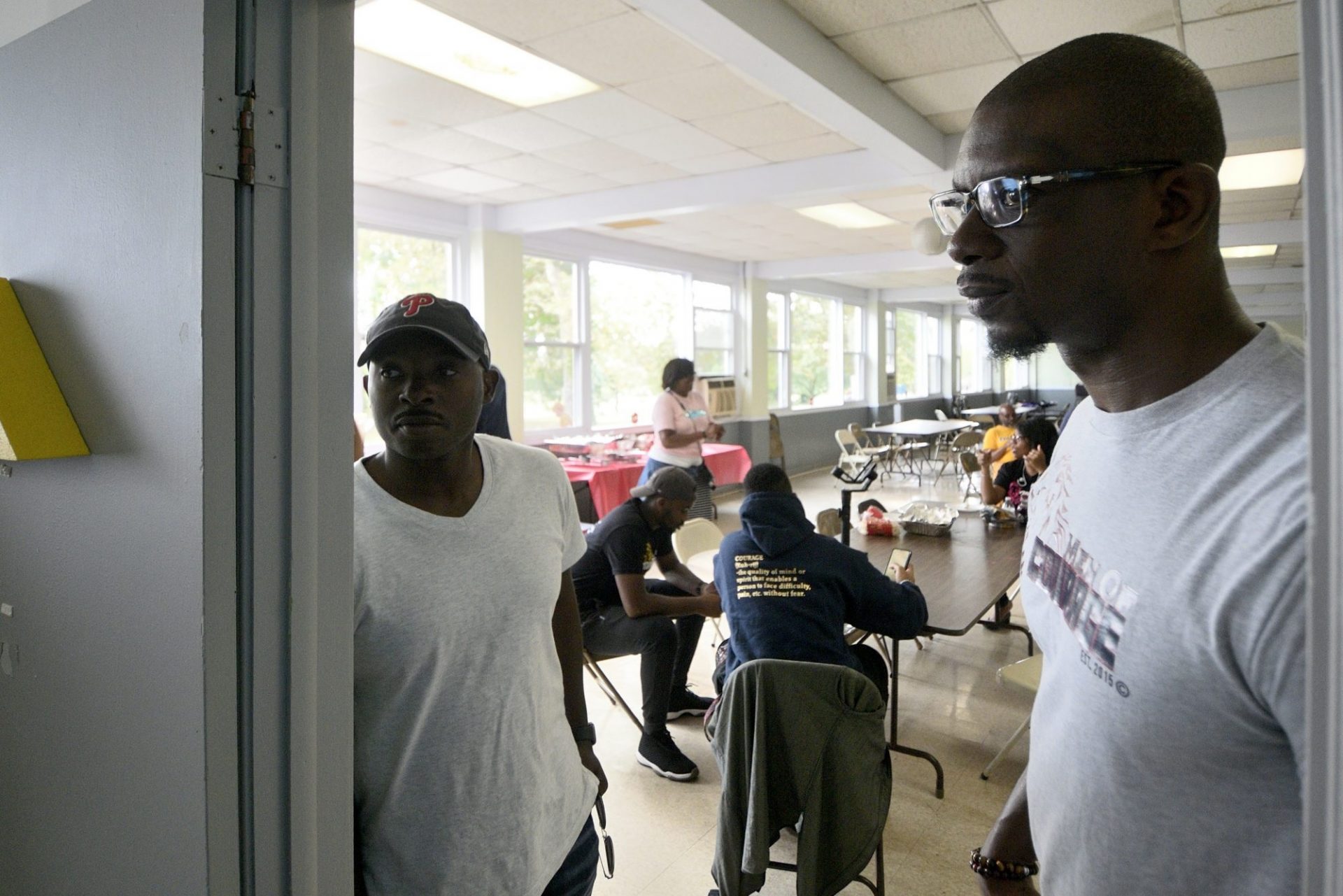 Taj Murdock, right, founder of TEAM Inc., watches a hip-hop therapy session led by Ronald Crawford during a mental health summit at The Kingdom Life Church Ministries, on Saturday. 