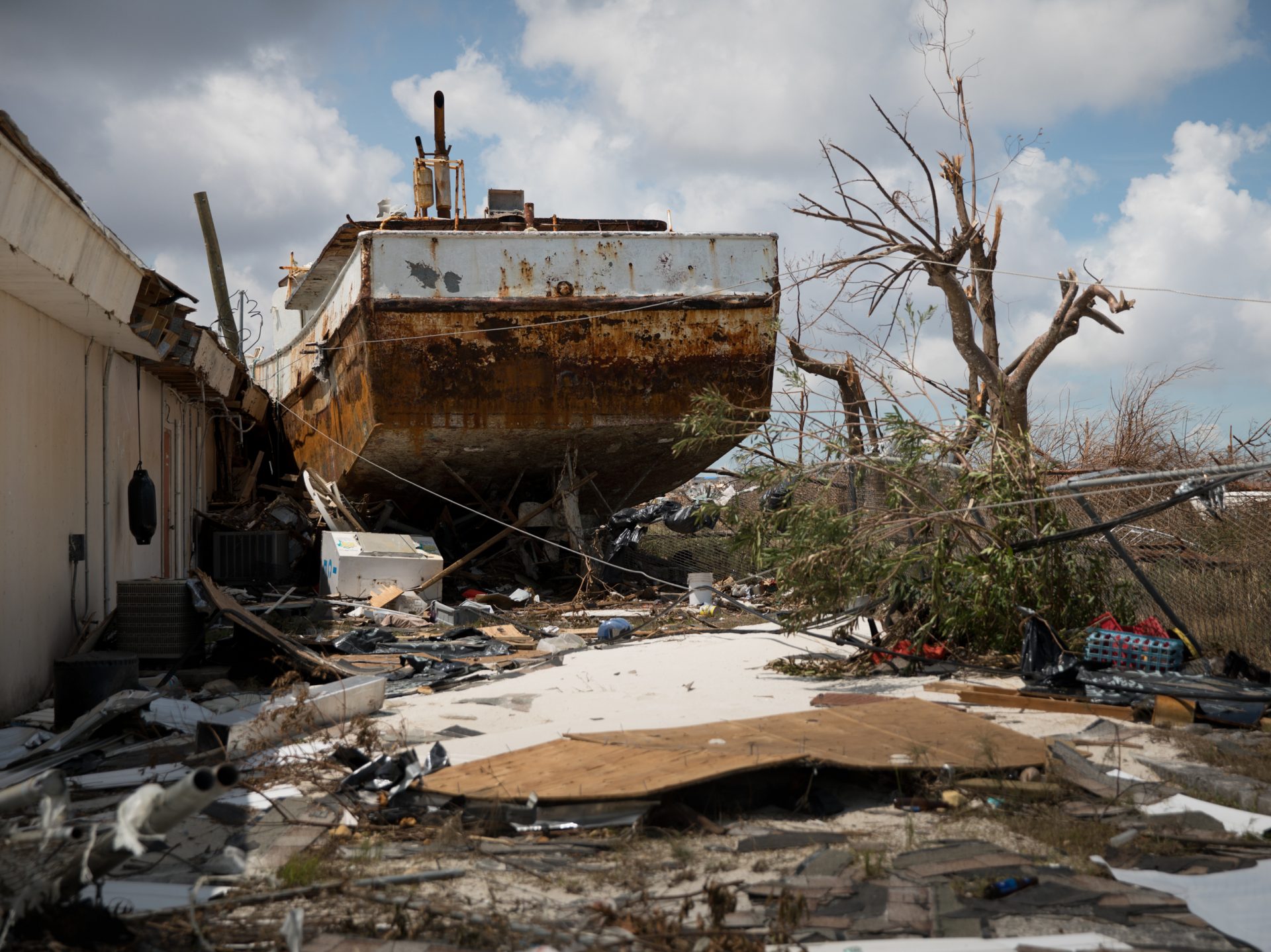 After the Category 5 storm slammed into the Bahamas this week, residents had to deal with wrecked houses and boats that came ashore.