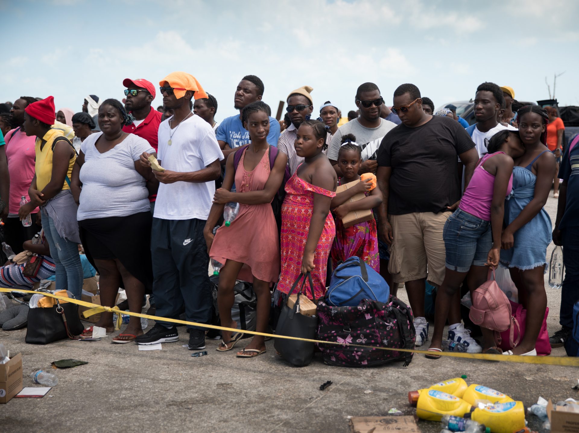 Hundreds wait at the port of Marsh Harbour in the hopes of boarding a boat to Nassau after the town on Abaco in the Bahamas was decimated by Hurricane Dorian.