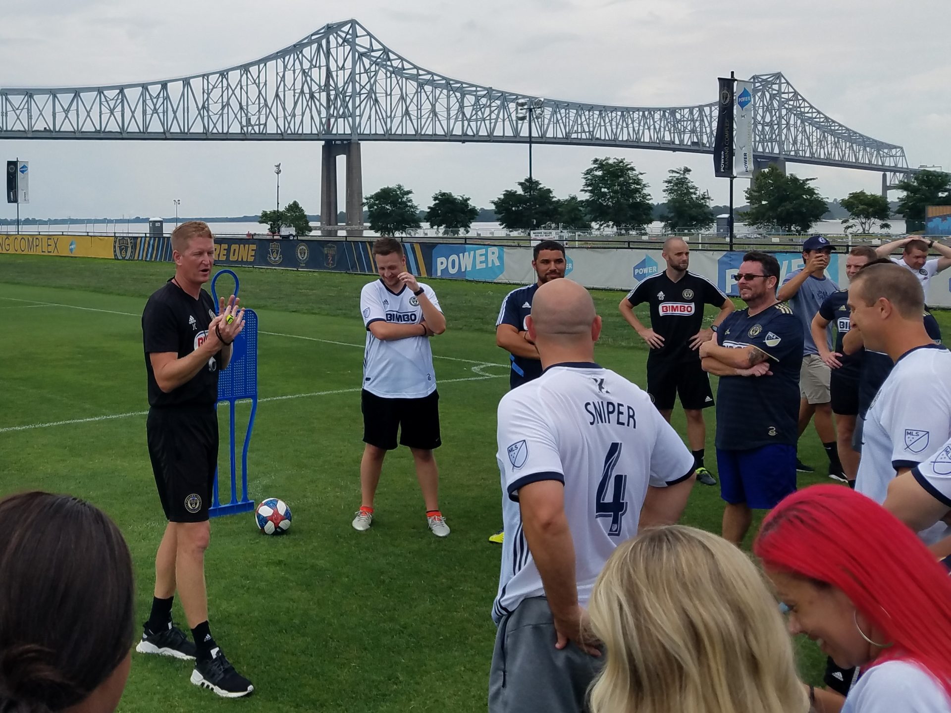 Philadelphia Union Head Coach Jim Curtin explains a drill on the team’s practice field in Chester.