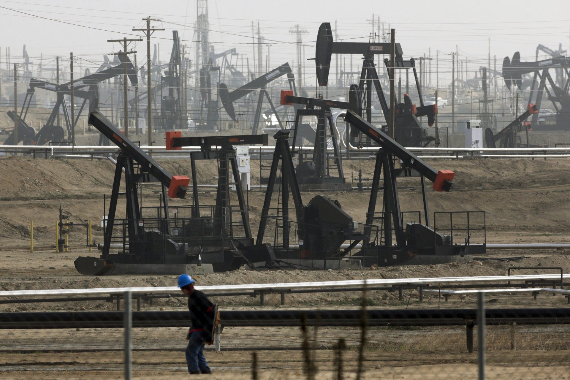 This Jan. 16, 2015, file photo shows pumpjacks operating at the Kern River Oil Field, in Bakersfield, Calif.