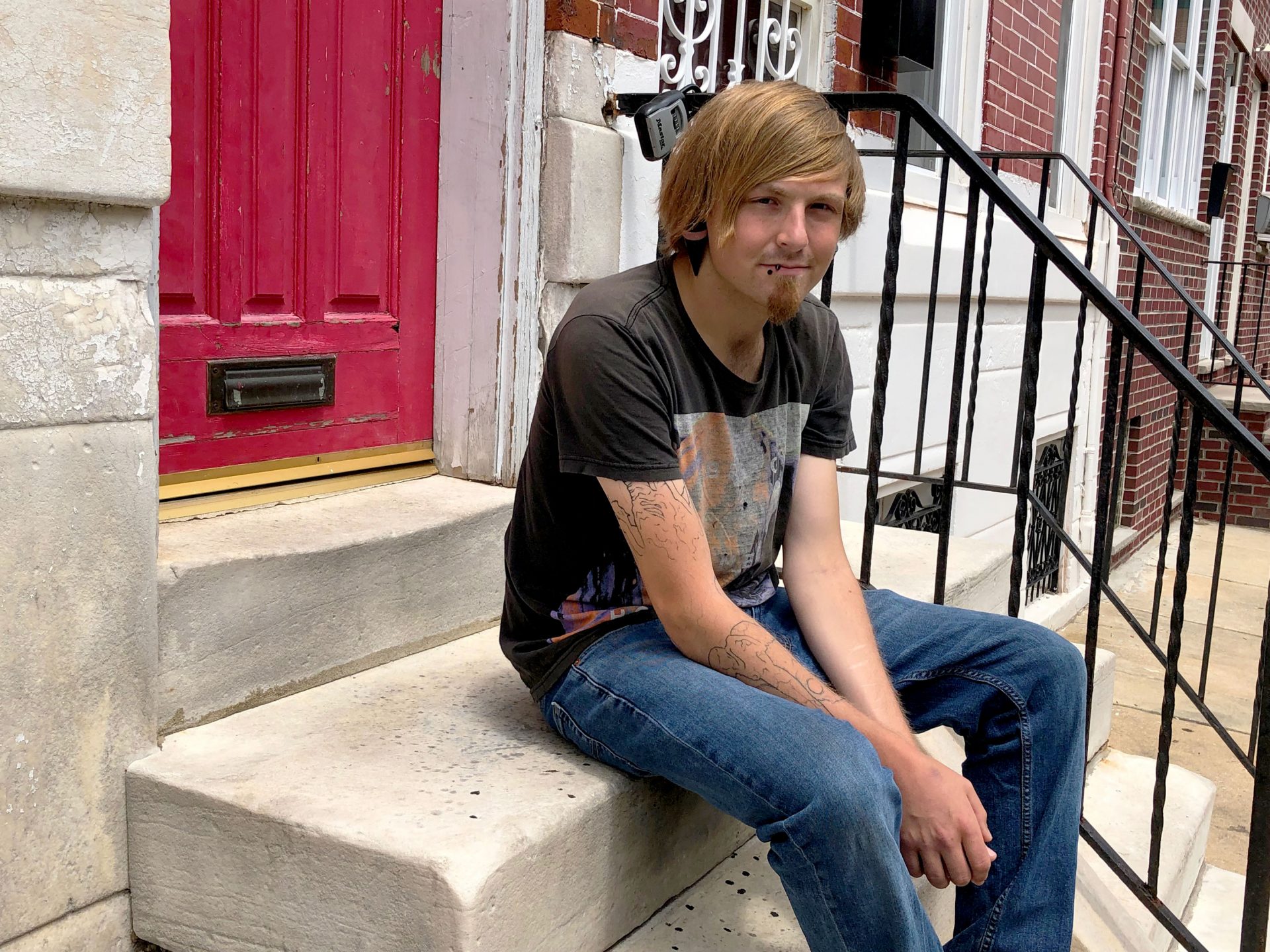 Brad Wienczkowski outside his recovery house in South Philly in June. Wienczkowski overdosed after being kicked out of treatment for smoking a cigarette.