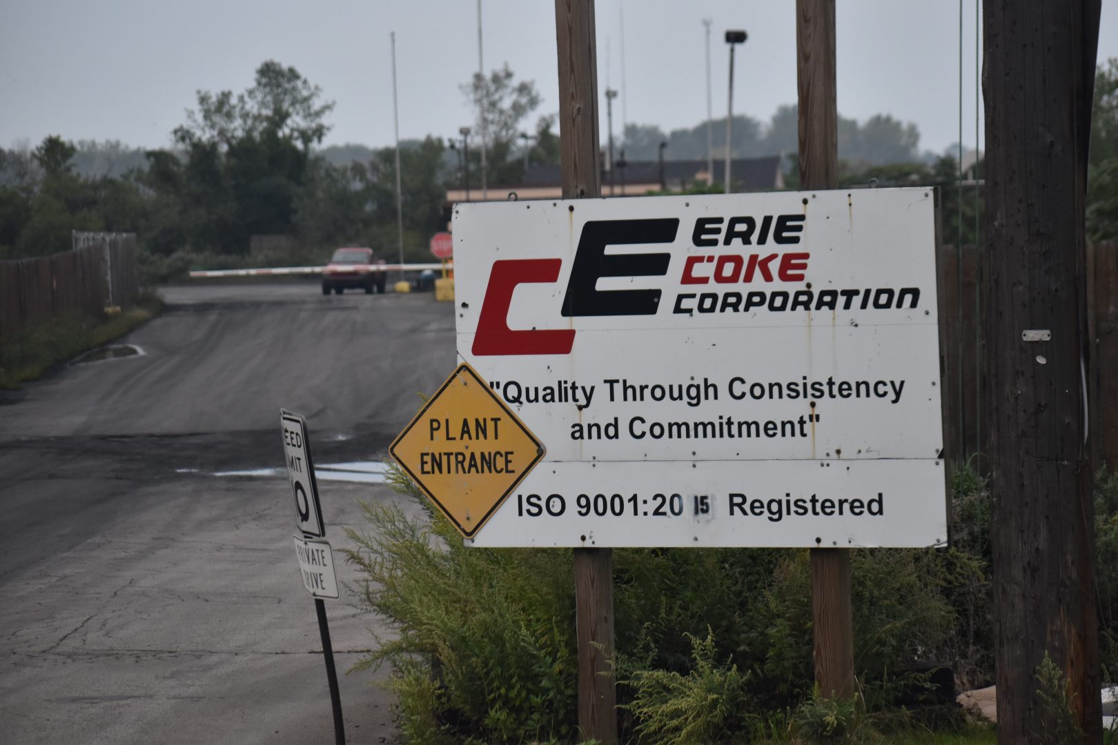 A sign for the entrance of Erie Coke.