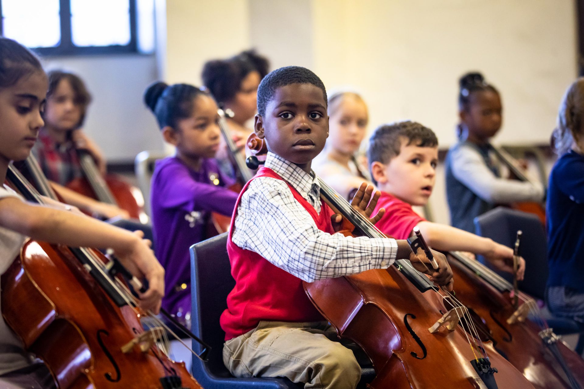 Students practice cello during a lesson at Hope Academy of Music and the Arts in East Liberty.