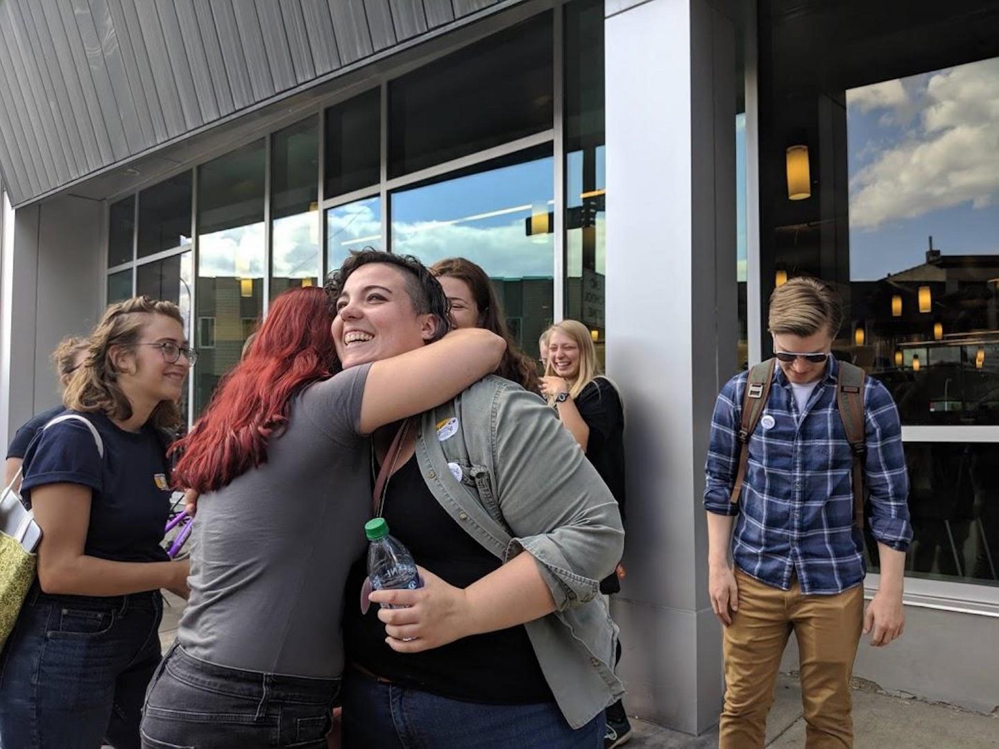 Google contract workers Gabrielle Norton-Moore (left) and Fran Baisden share a hug after finding out that their co-workers had voted 2-to-1 in favor of unionizing.