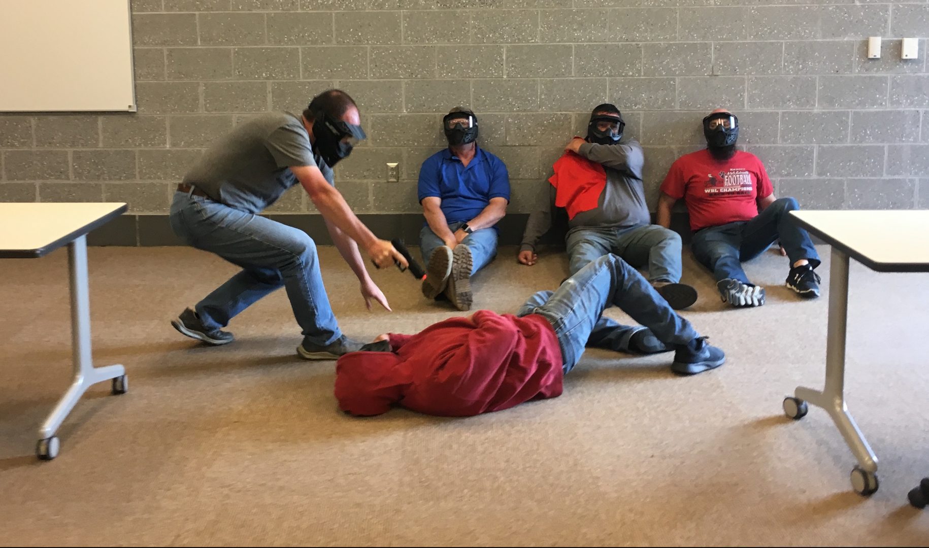Teachers practice responding to active shooter scenarios at Wadsworth High School in Ohio. Cerino tells the trainees pretending to be students, 