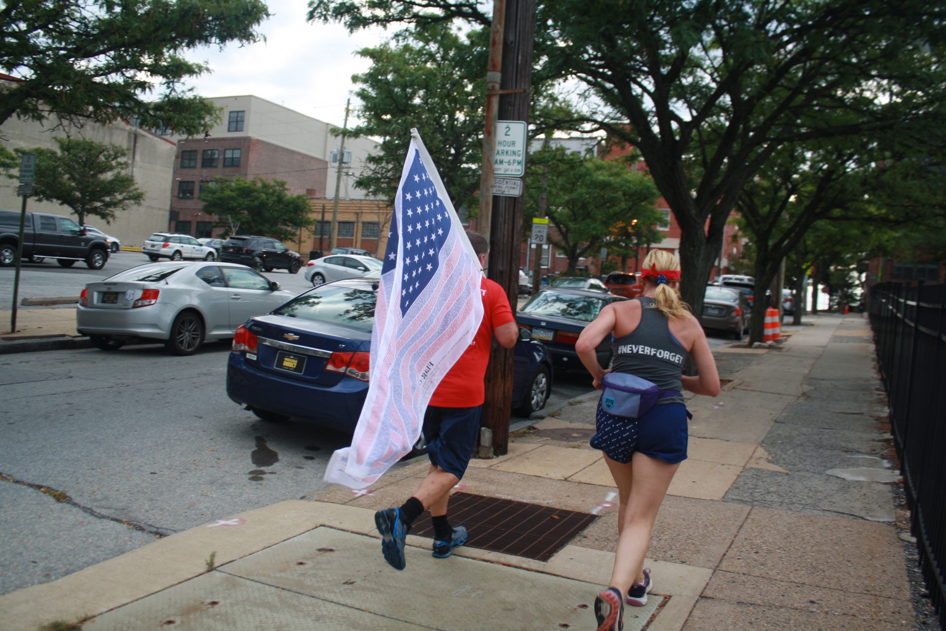 Runners head through downtown Wilmington on their way from the Pentagon to Ground Zero in New York City as part of the 243-mile 9/11 Promise Run.