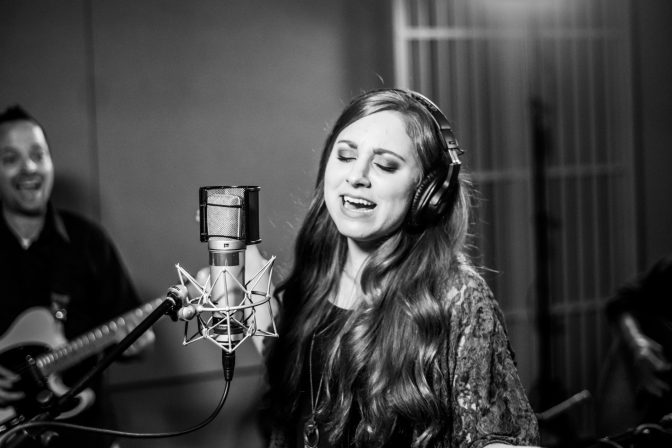 Stephanie Grace singing in the WITF Studio.
