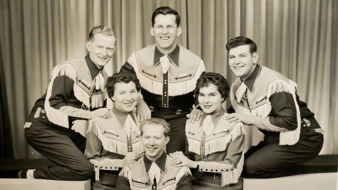 A black and white photo of Al Shade and the Short Mountain Boys and Girls