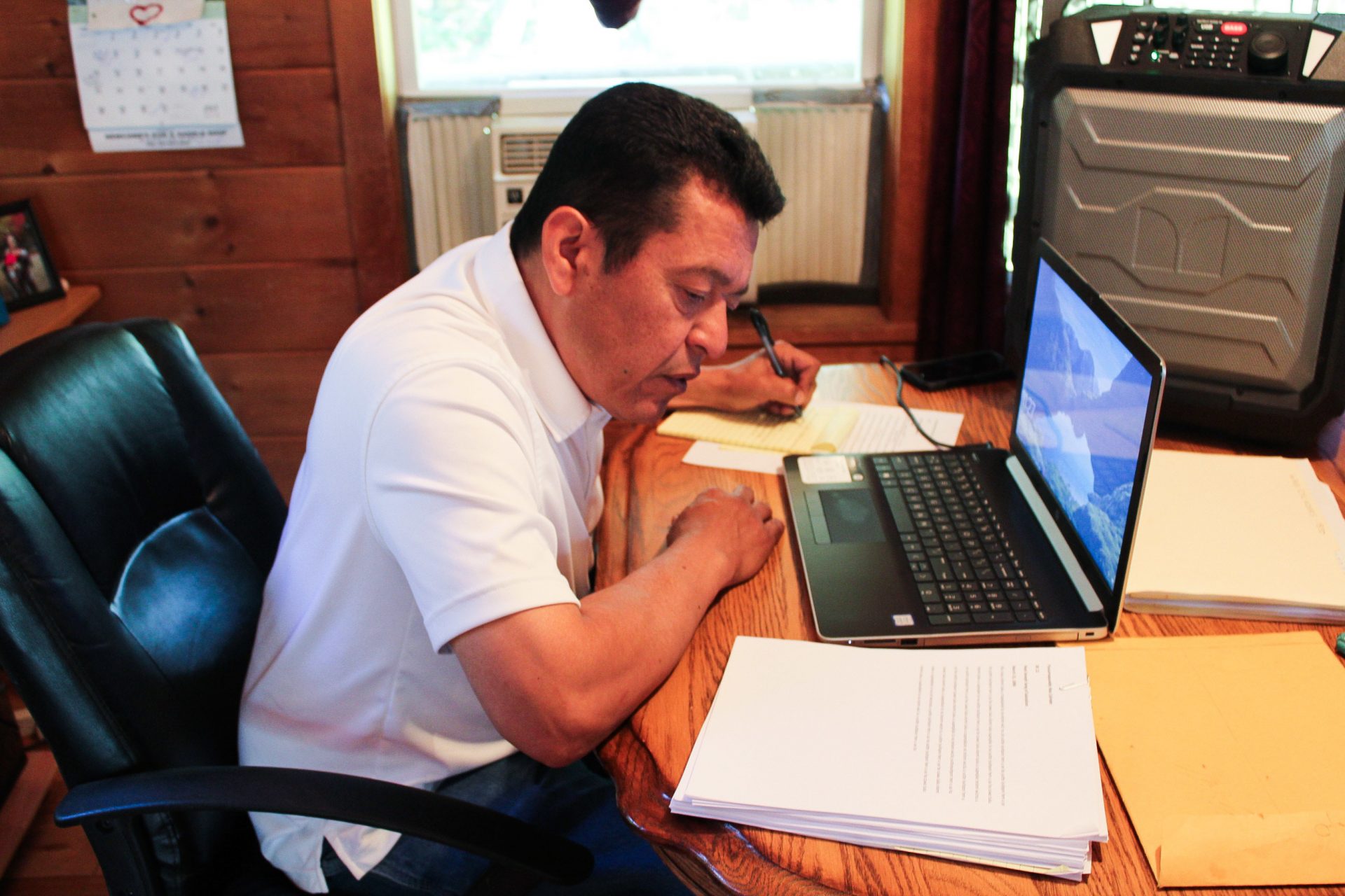 Dwayne Tomah listens to and transcribes an old Passamaquoddy story from a digital copy of a wax cylinder recording. Tomah and others in the Passamaquoddy tribe are translating and interpreting the 129-year-old wax cylinder recordings, which have been digitally restored.