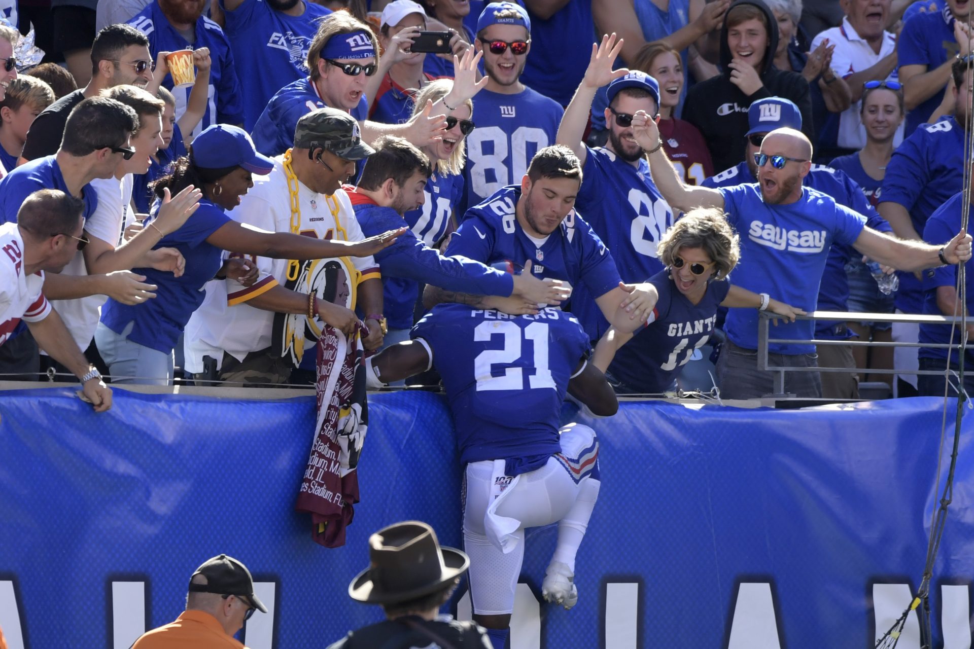 New York Giants free safety Jabrill Peppers celebrates his touchdown with Giants fans during the second half of an NFL football game against the Washington Redskins, Sunday, Sept. 29, 2019, in East Rutherford, N.J. 