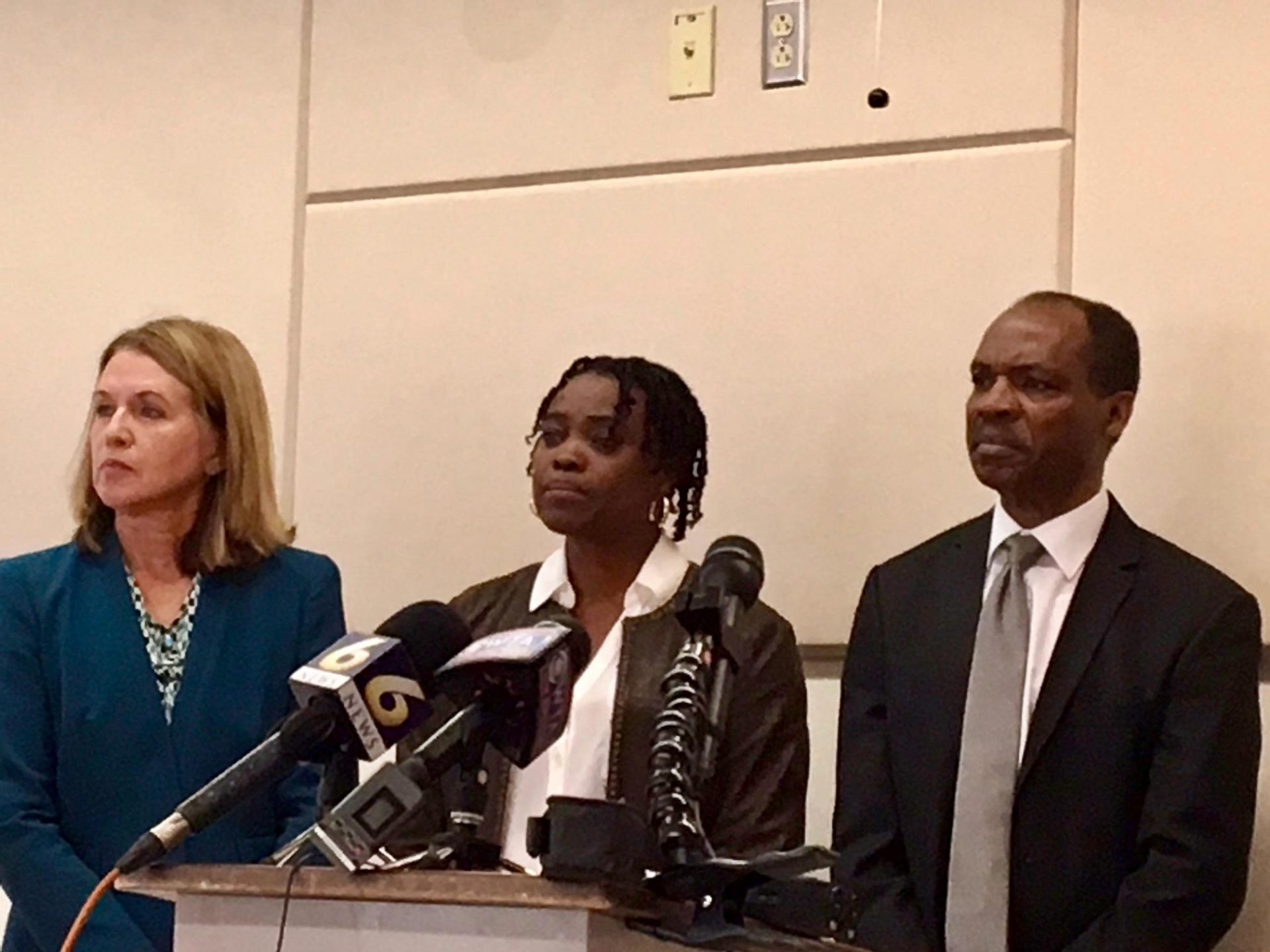 Attorney Kathleen Yurcak stands next to Iyunolu and Sylvester Osagie Sept. 12, 2019, during a press conference in the State College Borough Building. The family plans to sue the State College Police Department. Their son Osaze Osagie was fatally shot by police on March 20, 2019.