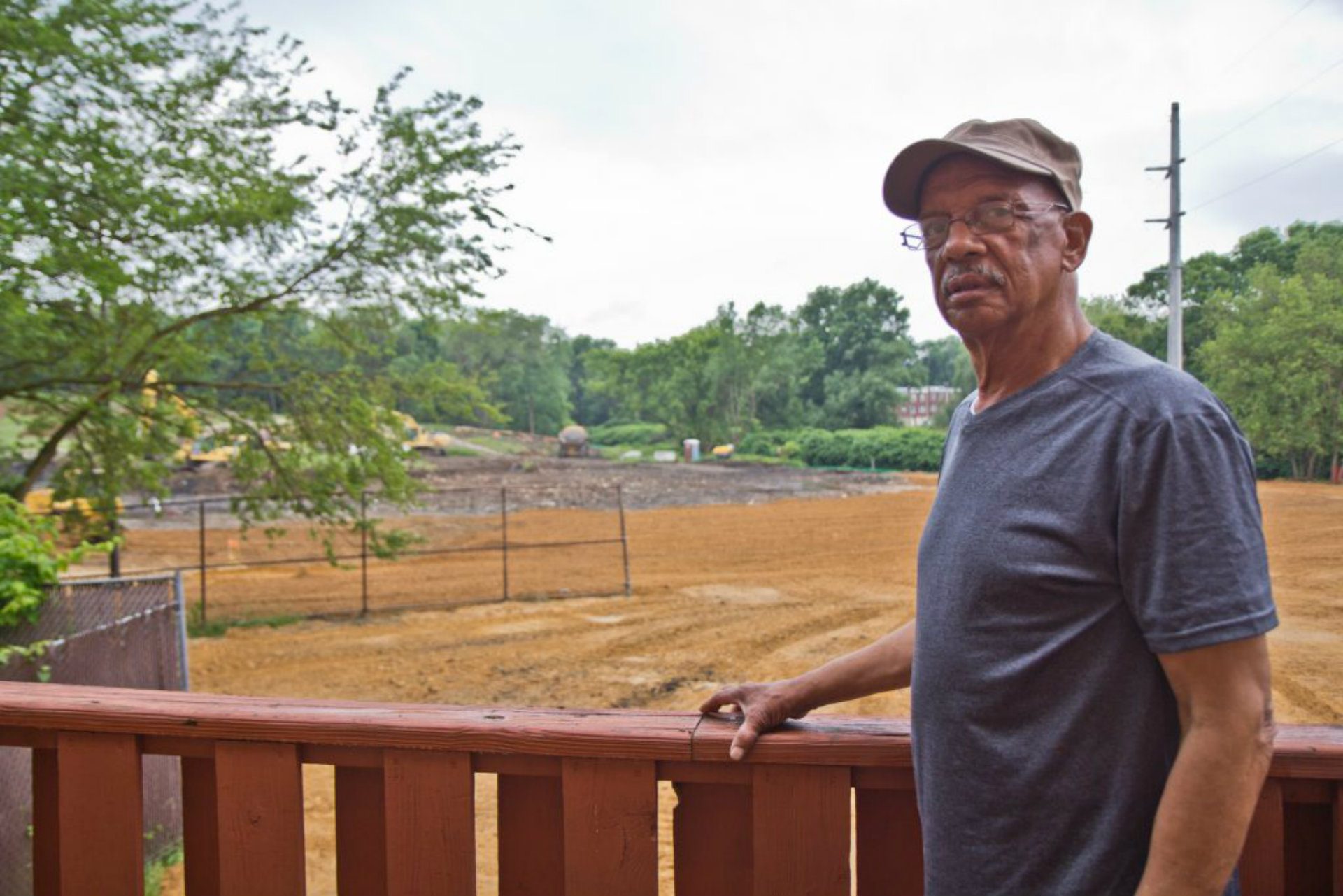 Leo Brudnrage’s deck overlooks the efforts at the Eastwick Superfund landfill site. (Kimberly Paynter/WHYY)