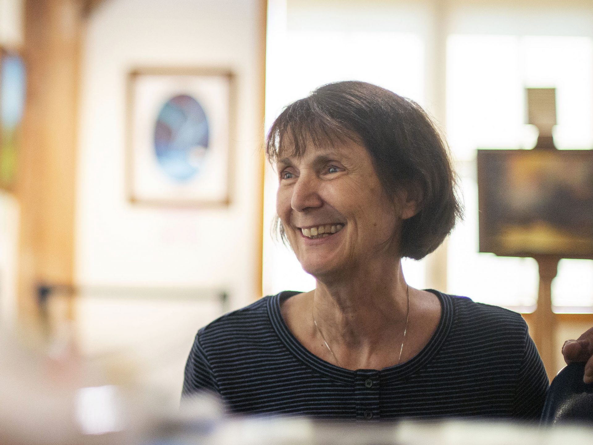 Susan Rossi traveled from Texas to participate in the class and see the exhibit. Rossi has used Bob Ross as a type of therapy after suffering from a stroke four years ago.