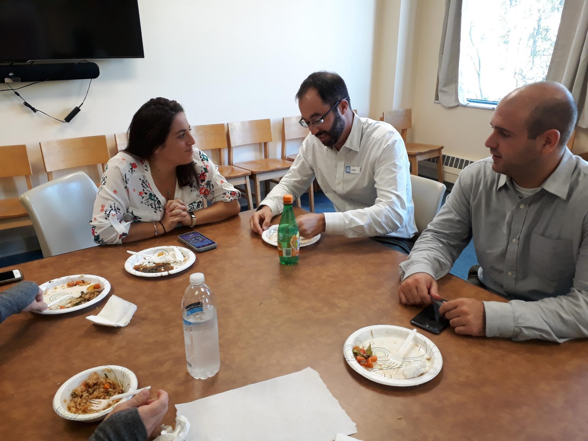 JCC staff eating lunch. The big Burrito Restaurant Group has been providing a weekly catered meal to employees of the community center since the attack at the Tree of Life Synagogue.